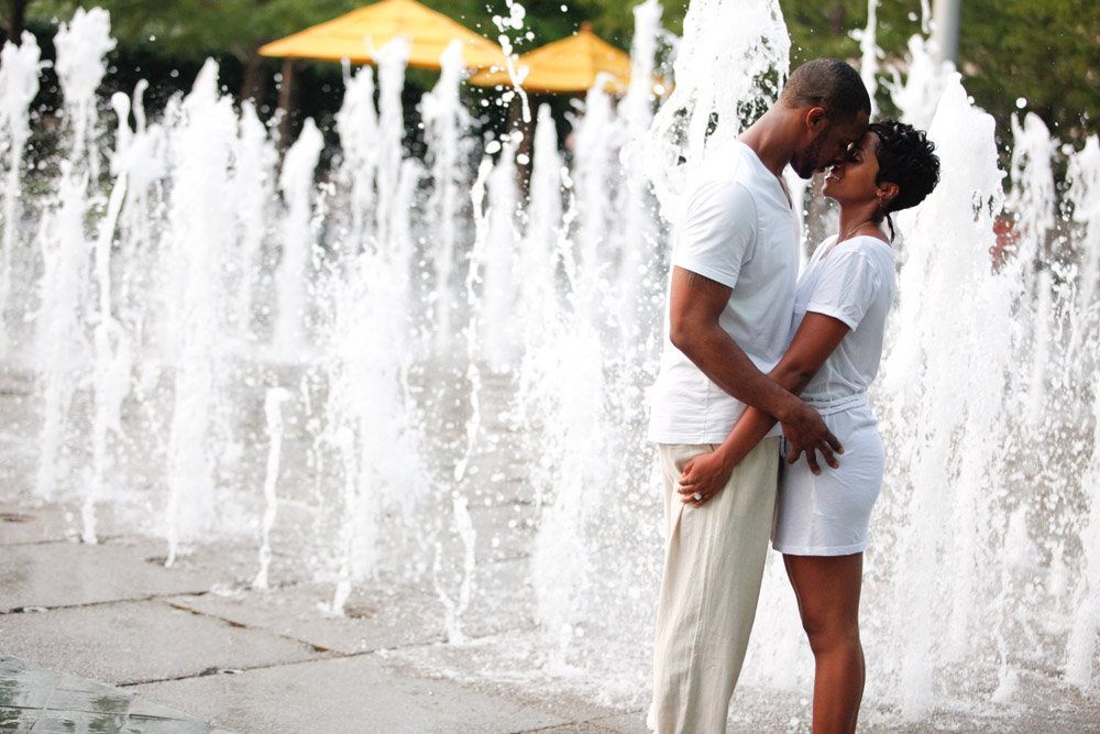 dallas downtown fountain water splash engagement