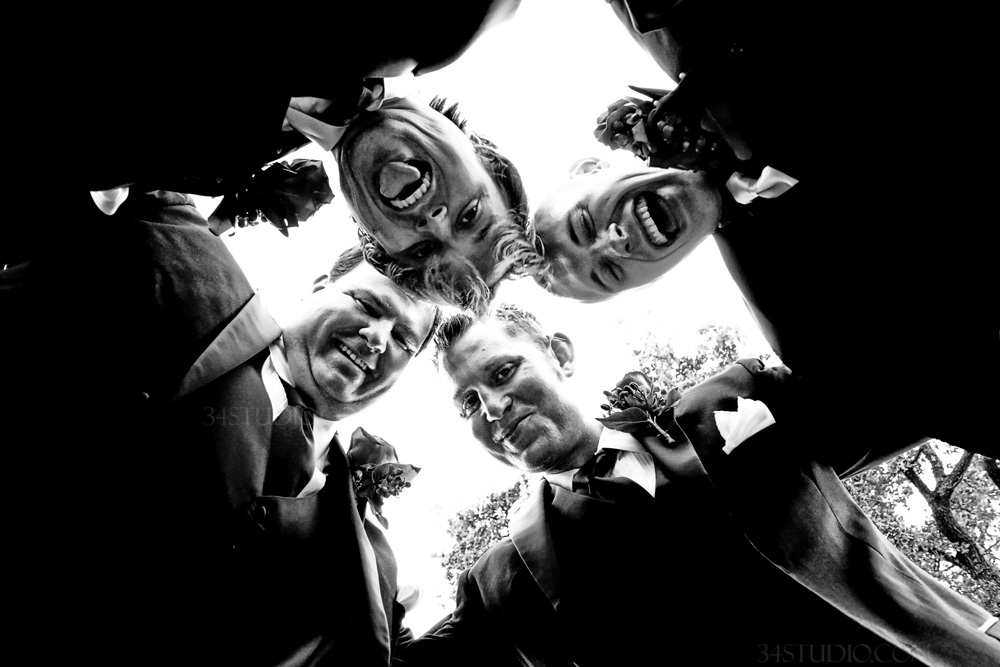 groomsmen are having fun black and white 