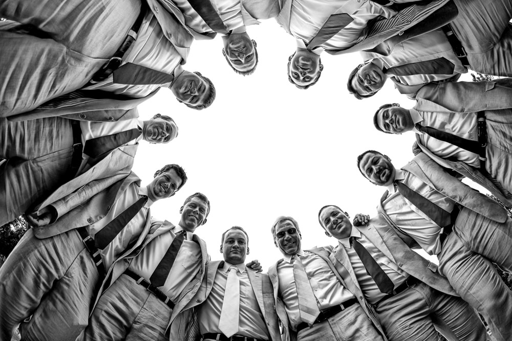 groomsmen having fun fish eye effect